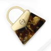 The new fashionable and creative acrylic handbag brooch is exquisite, simple and trendy. It is a versatile accessory for clothing Specification image